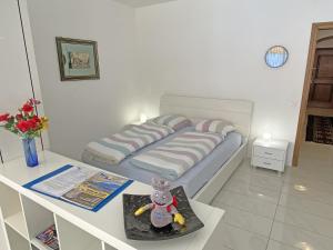 Ένα ή περισσότερα κρεβάτια σε δωμάτιο στο Casa Cincillà, 2 Stock by HolAp SA