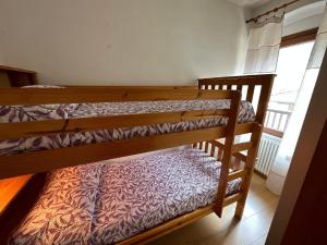 Postel nebo postele na pokoji v ubytování Wohnung 'Casa Anita' mit Wasserblick