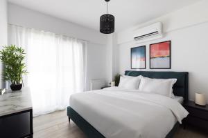 Ένα ή περισσότερα κρεβάτια σε δωμάτιο στο Superstudio Pop Art Apartments by BiNoBi!