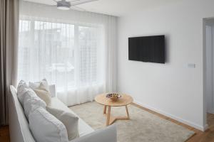 TV a/nebo společenská místnost v ubytování The Breeze