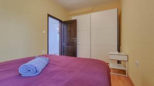 Posteľ alebo postele v izbe v ubytovaní Apartment Ticiana