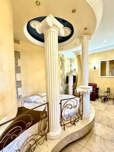 Postel nebo postele na pokoji v ubytování NEW BELLA HOTEL + 37 fotografií