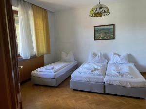 Posteľ alebo postele v izbe v ubytovaní Hotel-Restaurant Moser Pöchlarn