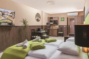 Postel nebo postele na pokoji v ubytování Park Hotel Bükfürdő