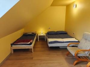 Postel nebo postele na pokoji v ubytování Zacisze Grojeckie