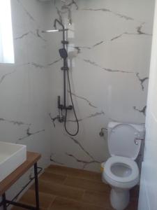 Koupelna v ubytování Ideal ApartHotel Saranda