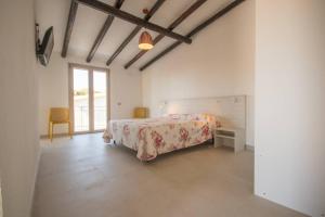 Ένα ή περισσότερα κρεβάτια σε δωμάτιο στο Conchiglia Sud