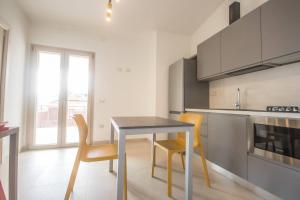 Η κουζίνα ή μικρή κουζίνα στο Conchiglia Sud