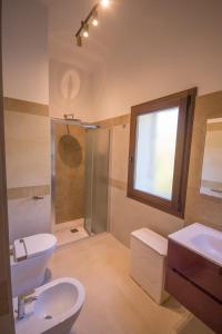 Et badeværelse på Ginepro Villa Capelvenere