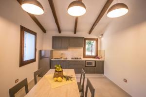Køkken eller tekøkken på Ginepro Villa Capelvenere