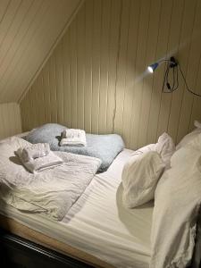 Postel nebo postele na pokoji v ubytování MyCondo no - Kong Sverres Gate 1