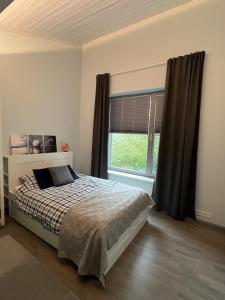 Postel nebo postele na pokoji v ubytování Villa Ariana