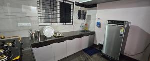 Η κουζίνα ή μικρή κουζίνα στο Premium Service apartment