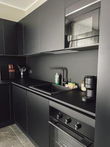 Kuchyň nebo kuchyňský kout v ubytování Comodo e Moderno Vicino Mare e Città