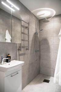 a bathroom with a sink and a shower at Mörrum River Residences in Mörrum