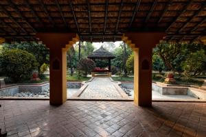 a pavilion with a gazebo in a park at Unnati Cultural Village Hospitality in Maruwā Ghāt