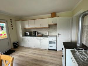 Köök või kööginurk majutusasutuses Haus Kleiner Seeblick