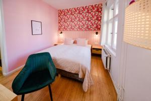 Postel nebo postele na pokoji v ubytování Old Town Hotel