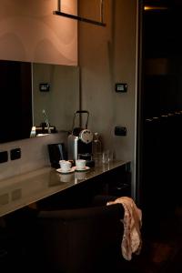 Köök või kööginurk majutusasutuses Axolute Comfort Hotel Como Cantù
