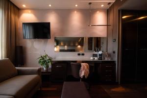 Köök või kööginurk majutusasutuses Axolute Comfort Hotel Como Cantù