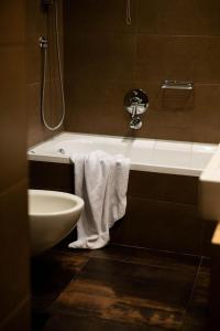 Koupelna v ubytování Axolute Comfort Hotel Como Cantù