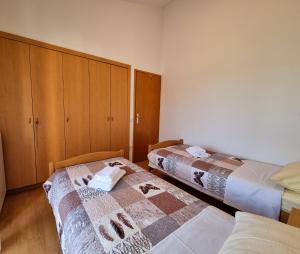 Postel nebo postele na pokoji v ubytování Juli No3 & No4