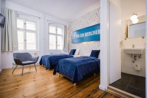 Postel nebo postele na pokoji v ubytování Old Town Hotel