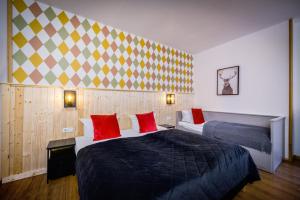 Postel nebo postele na pokoji v ubytování Old Town Hotel