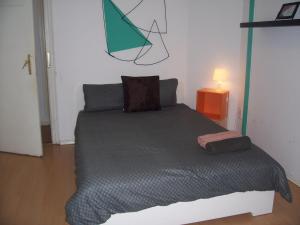 Posteľ alebo postele v izbe v ubytovaní Spark Apartment