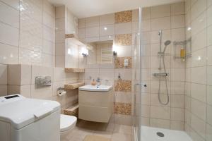 Ванна кімната в RentPlanet - Pogodne Osiedle