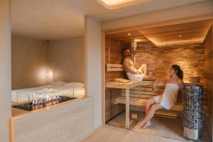 Postel nebo postele na pokoji v ubytování Woodz Lodges
