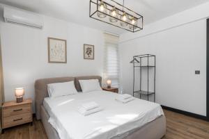 Photo de la galerie de l'établissement Olive Apartment, à Sveti Stefan 10 autres photos