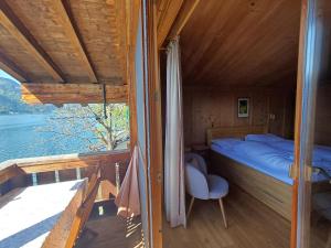 Posteľ alebo postele v izbe v ubytovaní Waterfront Apartments Zell am See - Steinbock Lodges