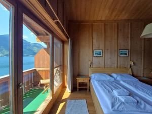 Posteľ alebo postele v izbe v ubytovaní Waterfront Apartments Zell am See - Steinbock Lodges