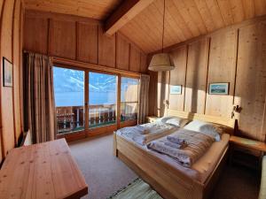 Posteľ alebo postele v izbe v ubytovaní Waterfront Apartments Zell am See - Steinbock Lodges