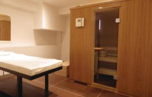 Postel nebo postele na pokoji v ubytování Apartmani Monaco