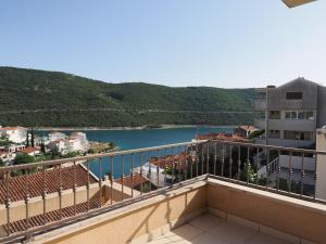 a balcony with a view of a river at Villa Njavro in Neum