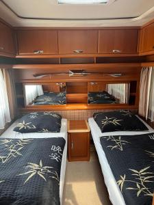 Postel nebo postele na pokoji v ubytování Camping Alex