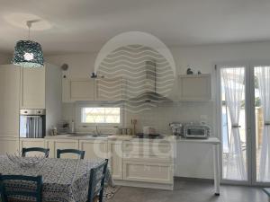 Køkken eller tekøkken på Villetta Kalamia - Piscina privata By Cala Salento