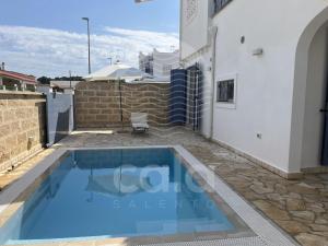 Swimmingpoolen hos eller tæt på Villetta Kalamia - Piscina privata By Cala Salento
