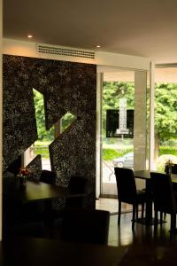 Istumisnurk majutusasutuses Axolute Comfort Hotel Como Cantù
