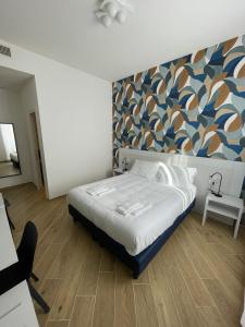 Postel nebo postele na pokoji v ubytování Il Dondolo Blu