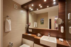 Koupelna v ubytování H+ Hotel & SPA Engelberg