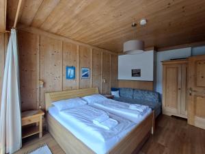 Posteľ alebo postele v izbe v ubytovaní Waterfront Apartments Zell am See - Steinbock Lodges