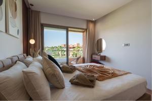 Postel nebo postele na pokoji v ubytování Alma Prestigia Appartments