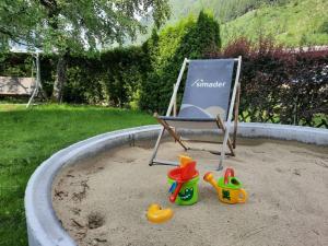 Um jardim em Hotel Simader