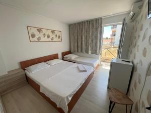 Postel nebo postele na pokoji v ubytování Casa Flaviu Eforie Sud
