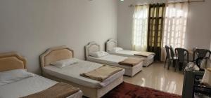 Giường trong phòng chung tại Gisa Hostel All Private Ensuite Rooms
