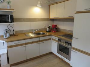 Køkken eller tekøkken på NEU! Ferienhuus Nordseeküste