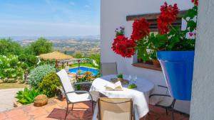 A balcony or terrace at Casa La Buhardilla del Gastor by Ruralidays